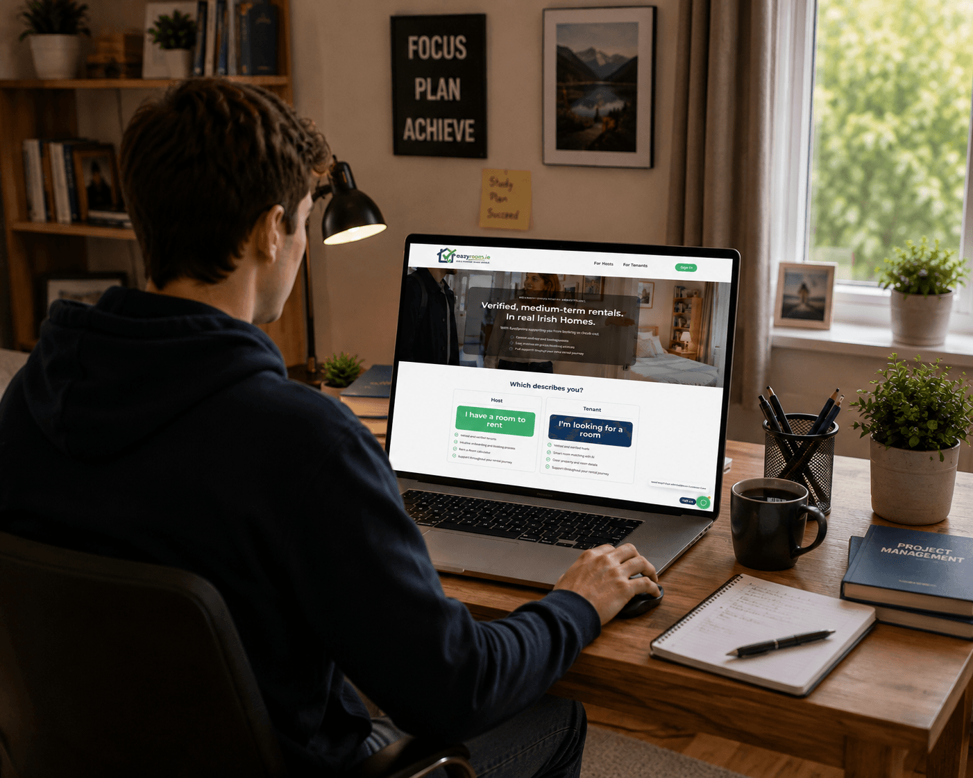A guest browsing EazyRoom on a laptop to book a room